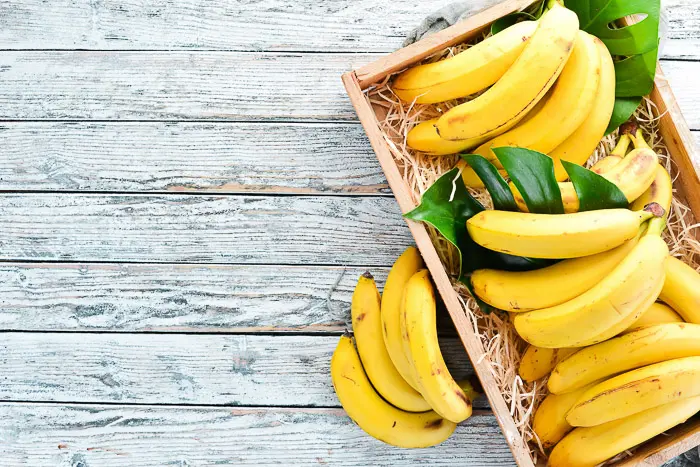 bananas in a wood tray